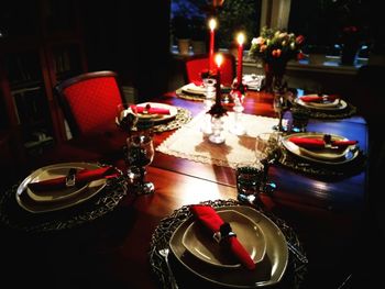 Close-up of illuminated lighting equipment on table