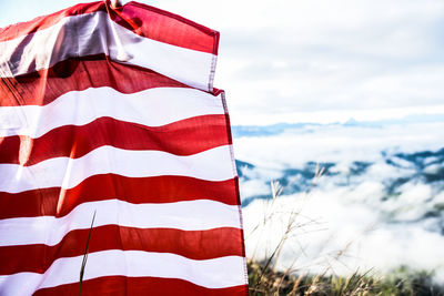 Close-up of flag against sky