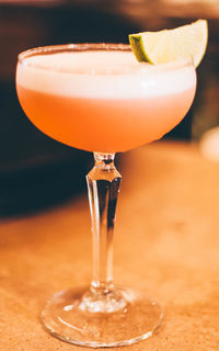 Close-up of cocktail served on table