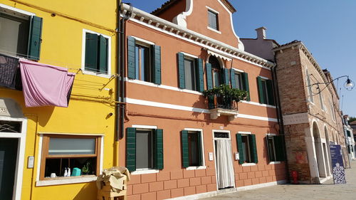 Low angle view of residential building against sky