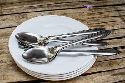 High angle view of metal in container on table