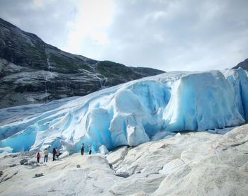 Scenic view of big ice berg against blue clear sky 