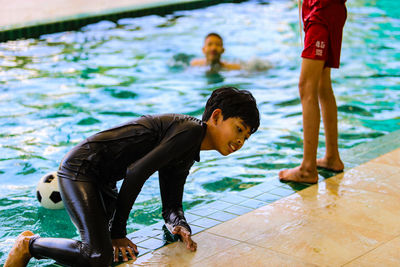 People swimming in pool