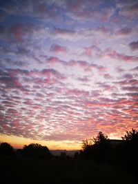 Scenic view of dramatic sky during sunset