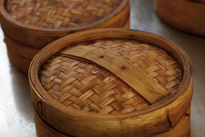 High angle view of wicker container on table