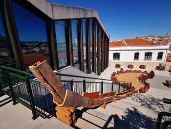 Low angle view of built structure against clear blue sky