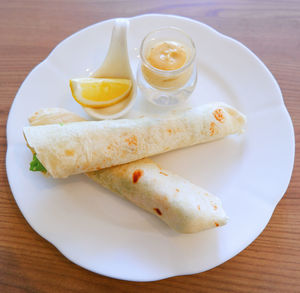 High angle view of bread in plate on table