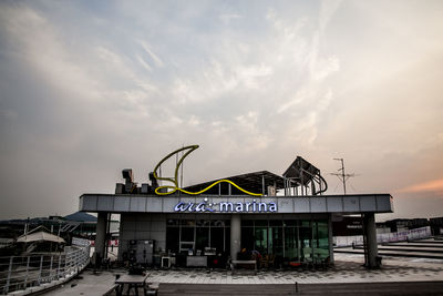 Building against cloudy sky