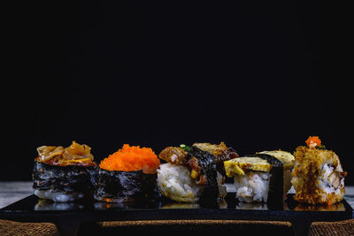 Close-up of food against black background