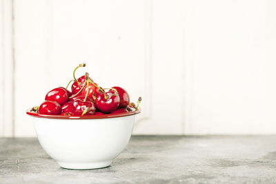 Close-up of red fruit on table