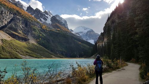 Scenic view of lake with mountains in background