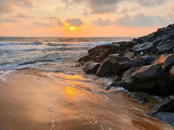 Scenic view of sea against sky during sunset