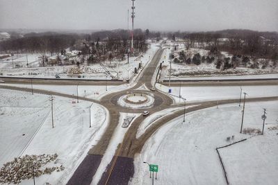 High angle view of vehicles on road in winter