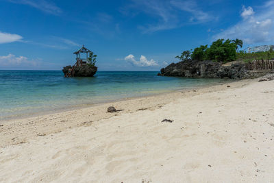 Scenic view of beach against sky