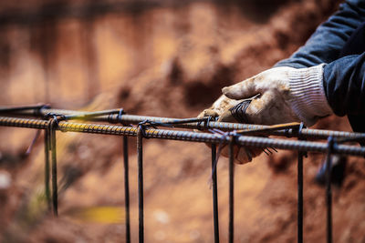 Person working on metal structure