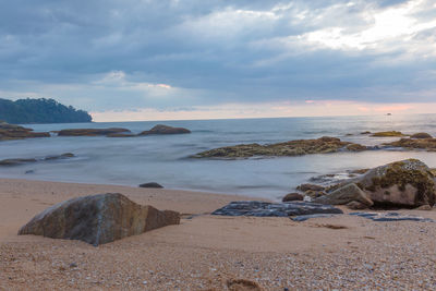 Scenic view of sea against sky at sunset