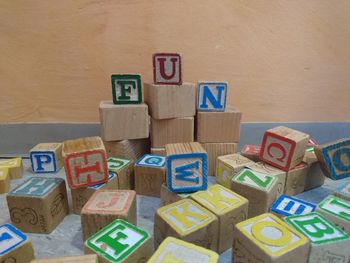 High angle view of toys on wooden floor