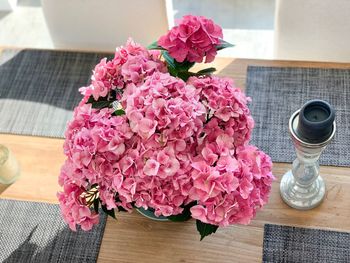 Close-up of pink flowers on table