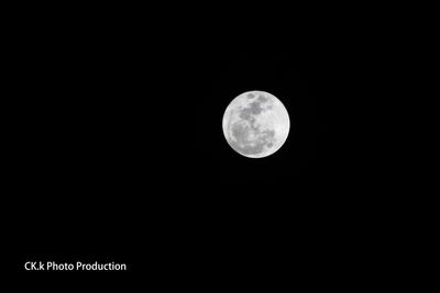 Low angle view of moon against clear sky at night