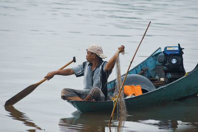 People kayaking in lake