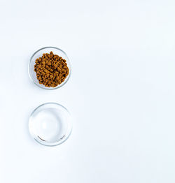 Close-up of pills on white background