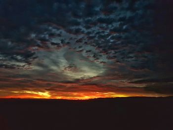 Scenic view of dramatic sky during sunset