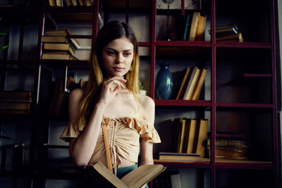 Young woman in book