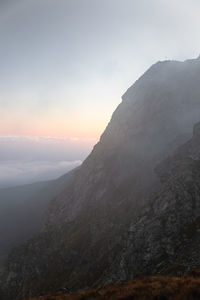 Scenic view of mountains against sky during sunset