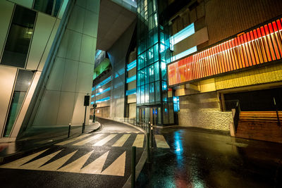 Illuminated modern building in city at night