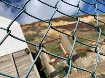 Full frame shot of chainlink fence on field