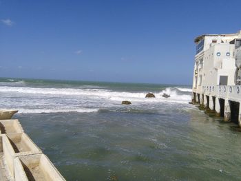 Scenic view of sea against blue sky