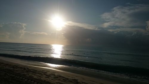 Scenic view of sea against sky at sunset