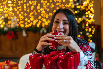 Young woman drinking juice