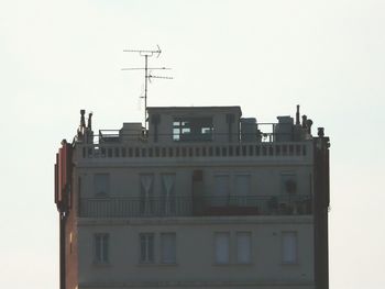 Low angle view of buildings against clear sky
