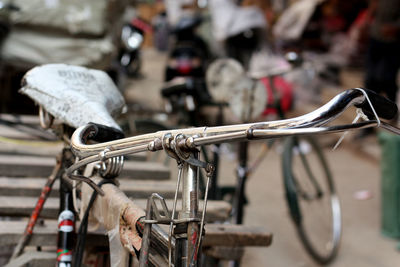 Close-up of bicycle in city