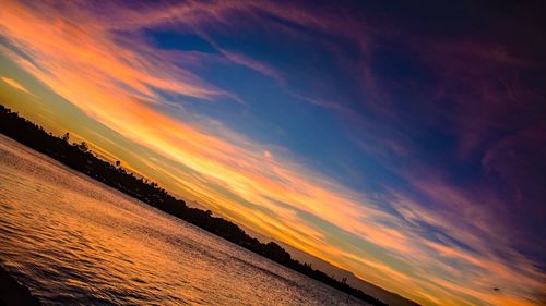 Scenic view of sea against sky at sunset