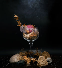 Close-up of wine against black background