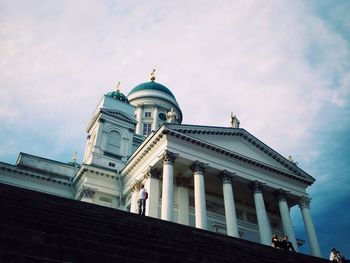 Low angle view of cathedral against cloudy sky