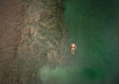 High angle view of person swimming in water