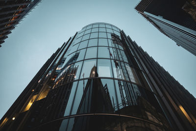 Low angle view of skyscraper against sky