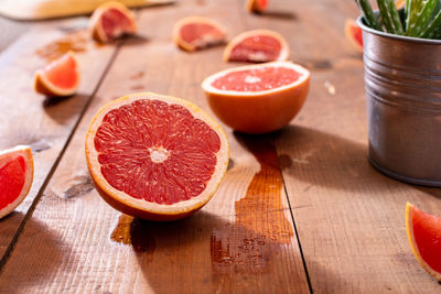 Close-up of orange juice on table