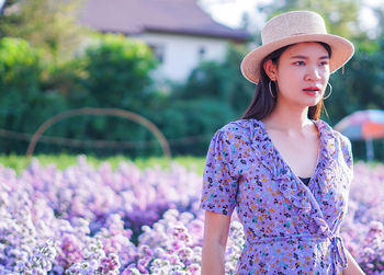 Young woman looking away outdoors