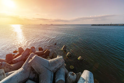 Scenic view of sea against sky during sunset