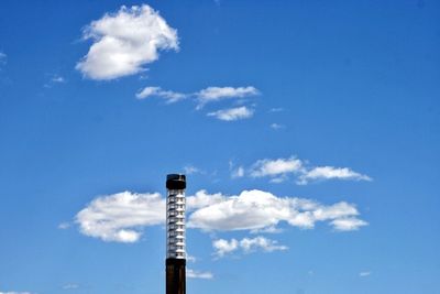 Low angle view of pole against sky