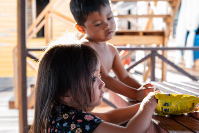 Mother and girl with toy