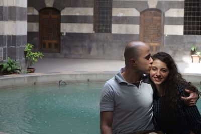 Young couple in swimming pool