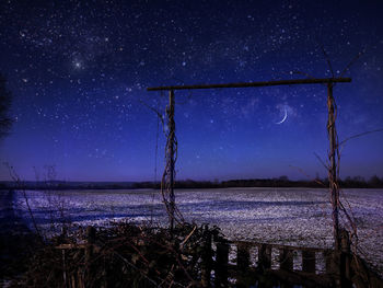 Scenic view of beach against sky at night