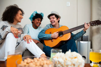 Group of people playing guitar