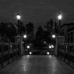 Street lights on footpath at night
