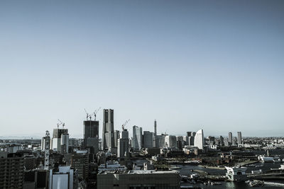 Cityscape against clear sky